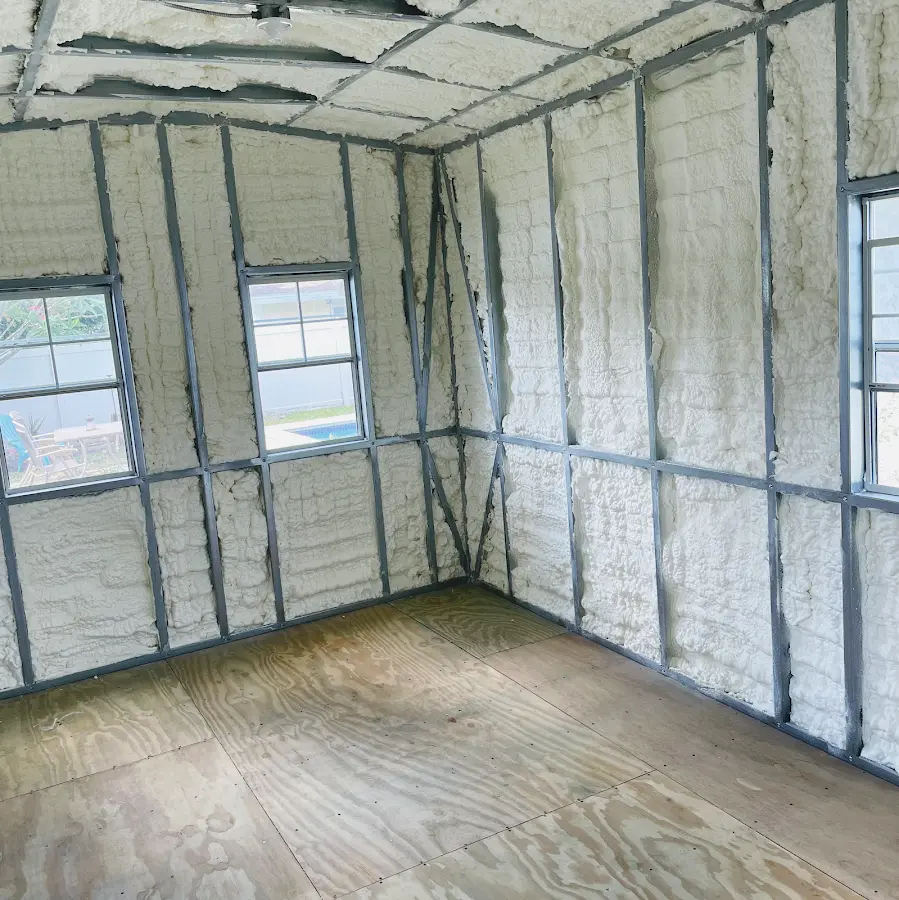 Closed-cell spray foam insulation applied to wall cavities in a residential project in International Falls